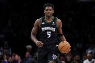 Minneapolis, Minnesota, USA; Minnesota Timberwolves guard Anthony Edwards (5) dribbles the ball against the San Antonio Spurs during the second half at Target Center. Mandatory Credit: Matt Krohn-Imagn Images