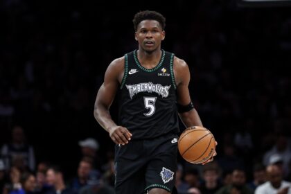 Minneapolis, Minnesota, USA; Minnesota Timberwolves guard Anthony Edwards (5) dribbles the ball against the San Antonio Spurs during the second half at Target Center. Mandatory Credit: Matt Krohn-Imagn Images