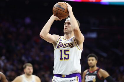 Dec 7, 2025; Philadelphia, Pennsylvania, USA; Los Angeles Lakers guard Austin Reaves (15) shoots a foul shot against the Philadelphia 76ers during the fourth quarter at Xfinity Mobile Arena. Mandatory Credit: Bill Streicher-Imagn Images