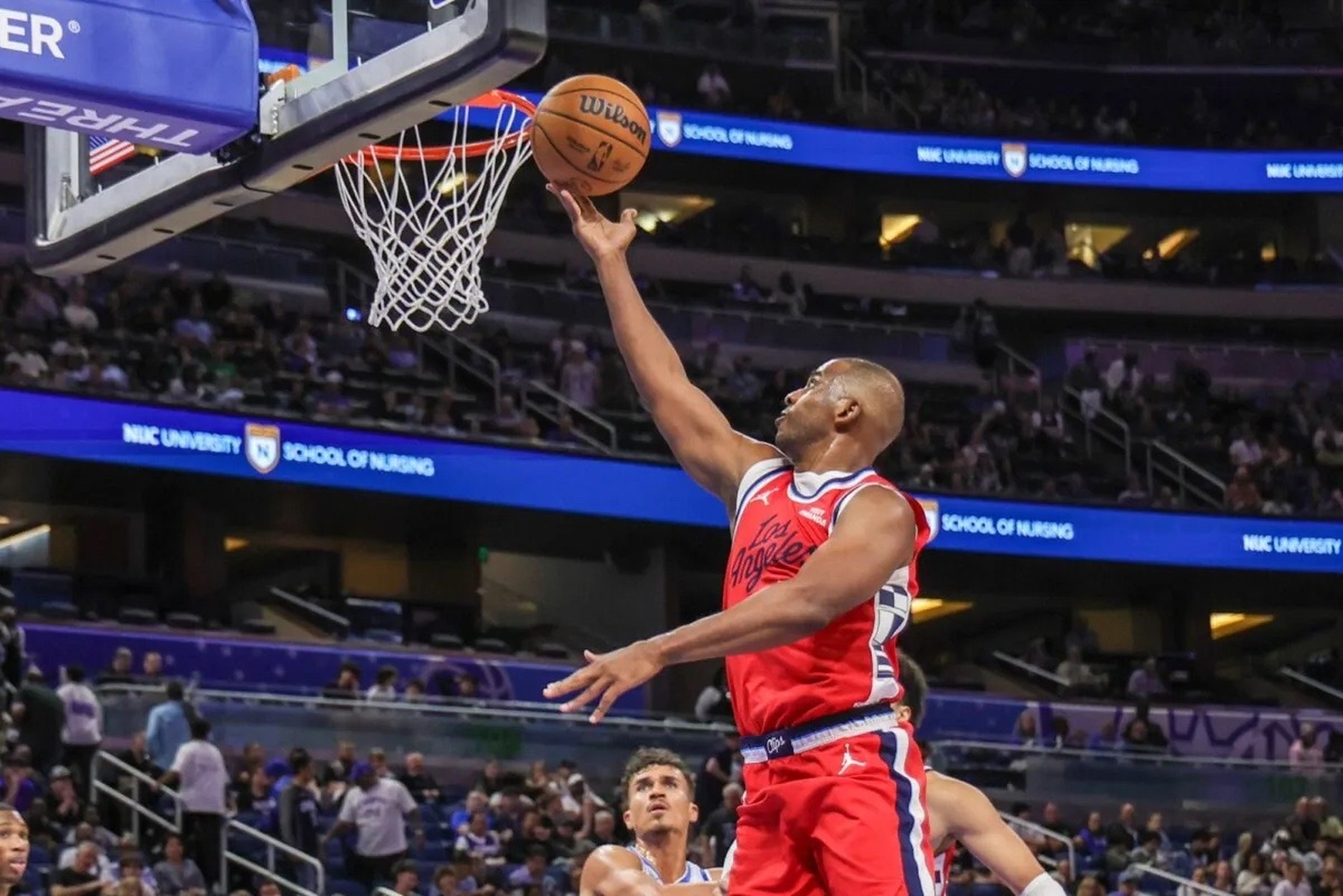 Nov 20, 2025; Orlando, Florida, USA; LA Clippers guard Chris Paul (3) goes to the basket during the second half against the Orlando Magic at Kia Center. Mandatory Credit: Mike Watters-Imagn Images
