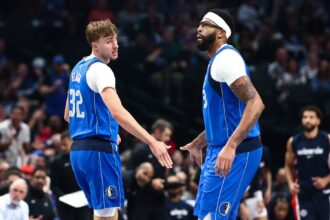 Oct 24, 2025; Dallas, Texas, USA; Dallas Mavericks forward Cooper Flagg (32) celebrates with Dallas Mavericks forward Anthony Davis (3) during the first quarter against the Washington Wizards at American Airlines Center. Mandatory Credit: Kevin Jairaj-Imagn Images
