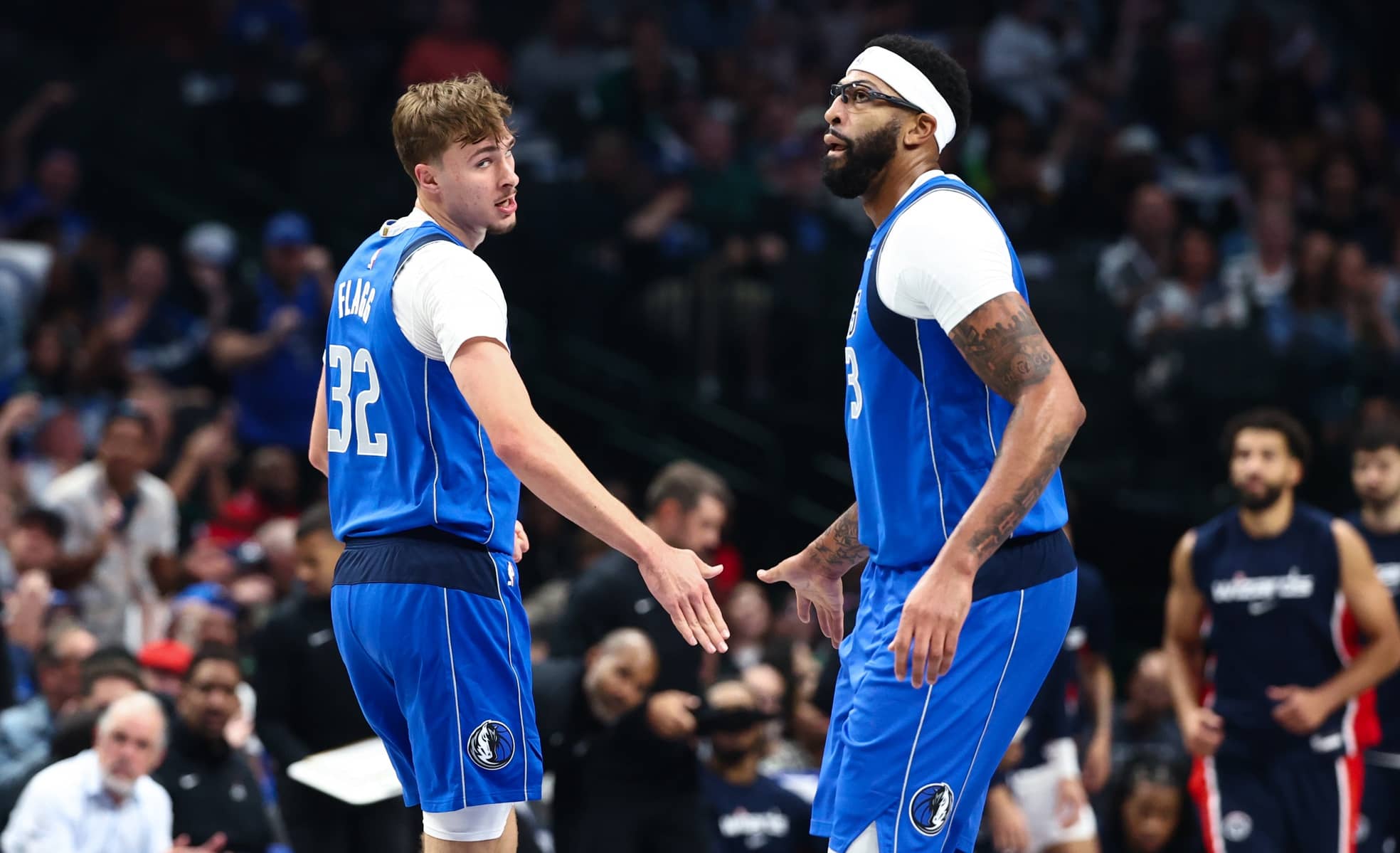 Oct 24, 2025; Dallas, Texas, USA; Dallas Mavericks forward Cooper Flagg (32) celebrates with Dallas Mavericks forward Anthony Davis (3) during the first quarter against the Washington Wizards at American Airlines Center. Mandatory Credit: Kevin Jairaj-Imagn Images