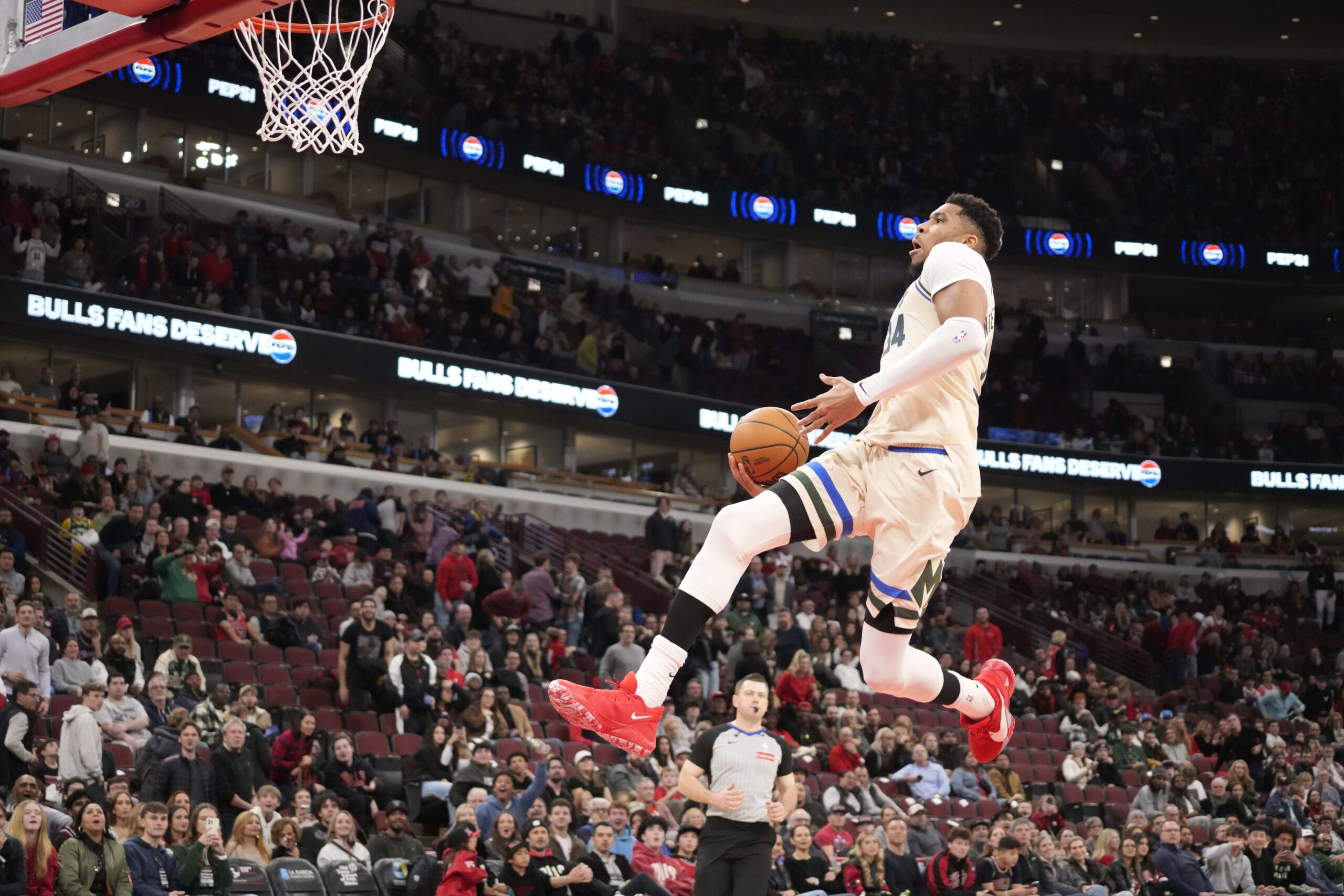 Dec 27, 2025; Chicago, Illinois, USA; Milwaukee Bucks forward Giannis Antetokounmpo (34) goes up for a dunk against the Chicago Bulls during the second half at United Center. Mandatory Credit: David Banks-Imagn Images