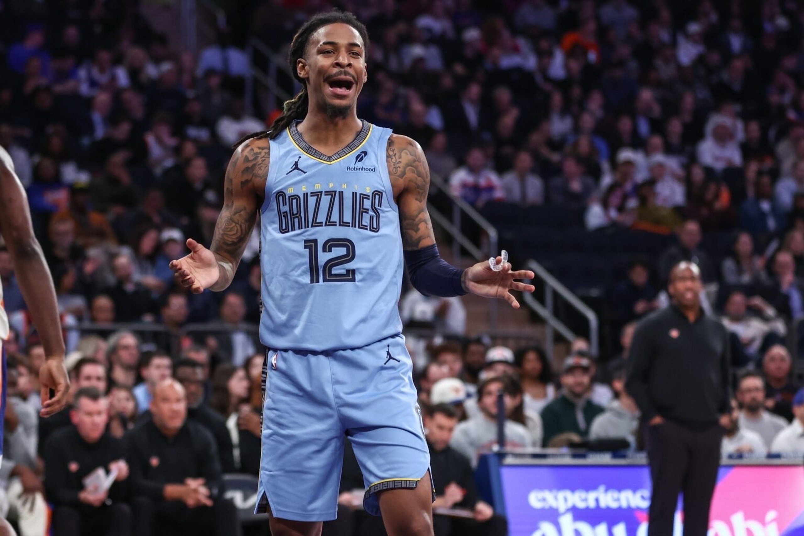 Nov 11, 2025; New York, New York, USA; Memphis Grizzlies guard Ja Morant (12) reacts after getting called for a foul in the second quarter against the New York Knicks at Madison Square Garden. Mandatory Credit: Wendell Cruz-Imagn Images