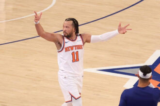 New York, New York, USA; New York Knicks guard Jalen Brunson (11) reacts after a three point shot against the Indiana Pacers in the first quarter during game five of the eastern conference finals for the 2025 NBA Playoffs at Madison Square Garden. Mandatory Credit: Vincent Carchietta-Imagn Images