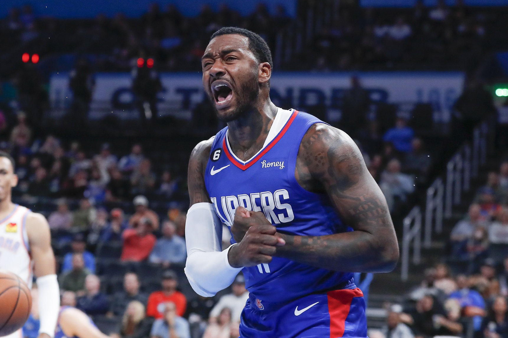 Oct 27, 2022; Oklahoma City, Oklahoma, USA; LA Clippers guard John Wall (11) reacts after scoring a basket against the Oklahoma City Thunder during the second half at Paycom Center. Oklahoma City won 118-110. Mandatory Credit: Alonzo Adams-USA TODAY Sports