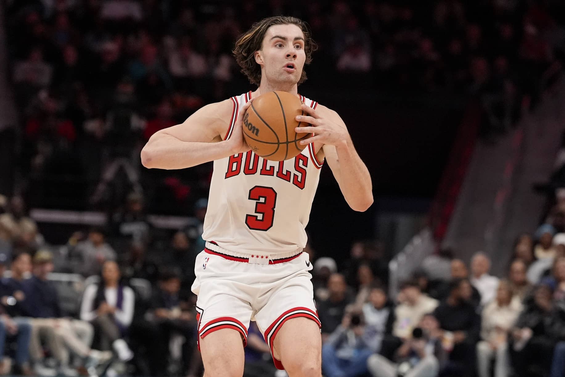 Chicago Bulls guard Josh Giddey (3) looks to pass against the Charlotte Hornets during the second half at Spectrum Center.
