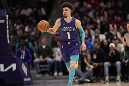 Mar 20, 2025; Charlotte, North Carolina, USA; Charlotte Hornets guard LaMelo Ball (1) brings the ball up court against the New York Knicks during the second half at Spectrum Center. Mandatory Credit: Jim Dedmon-Imagn Images