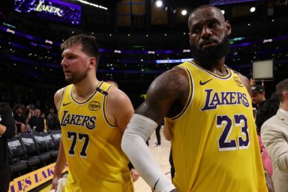 Los Angeles Lakers guard Luka Doncic (77) and Los Angeles Lakers forward LeBron James (23) leave a court after defeating the Minnesota Timberwolves 94-85 in game two of first round for the 2024 NBA Playoffs at Crypto.com Arena.