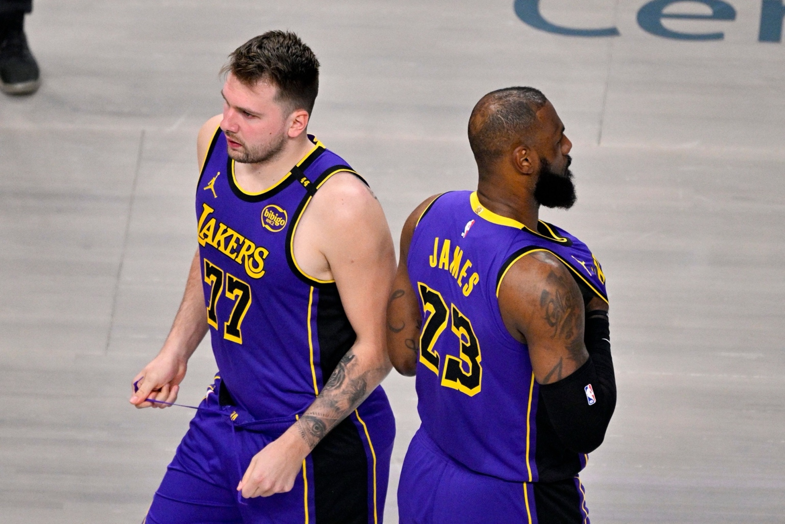 Apr 9, 2025; Dallas, Texas, USA; Los Angeles Lakers guard Luka Doncic (77) and forward LeBron James (23) during the game between the Dallas Mavericks and the Los Angeles Lakers at American Airlines Center. Mandatory Credit: Jerome Miron-Imagn Images