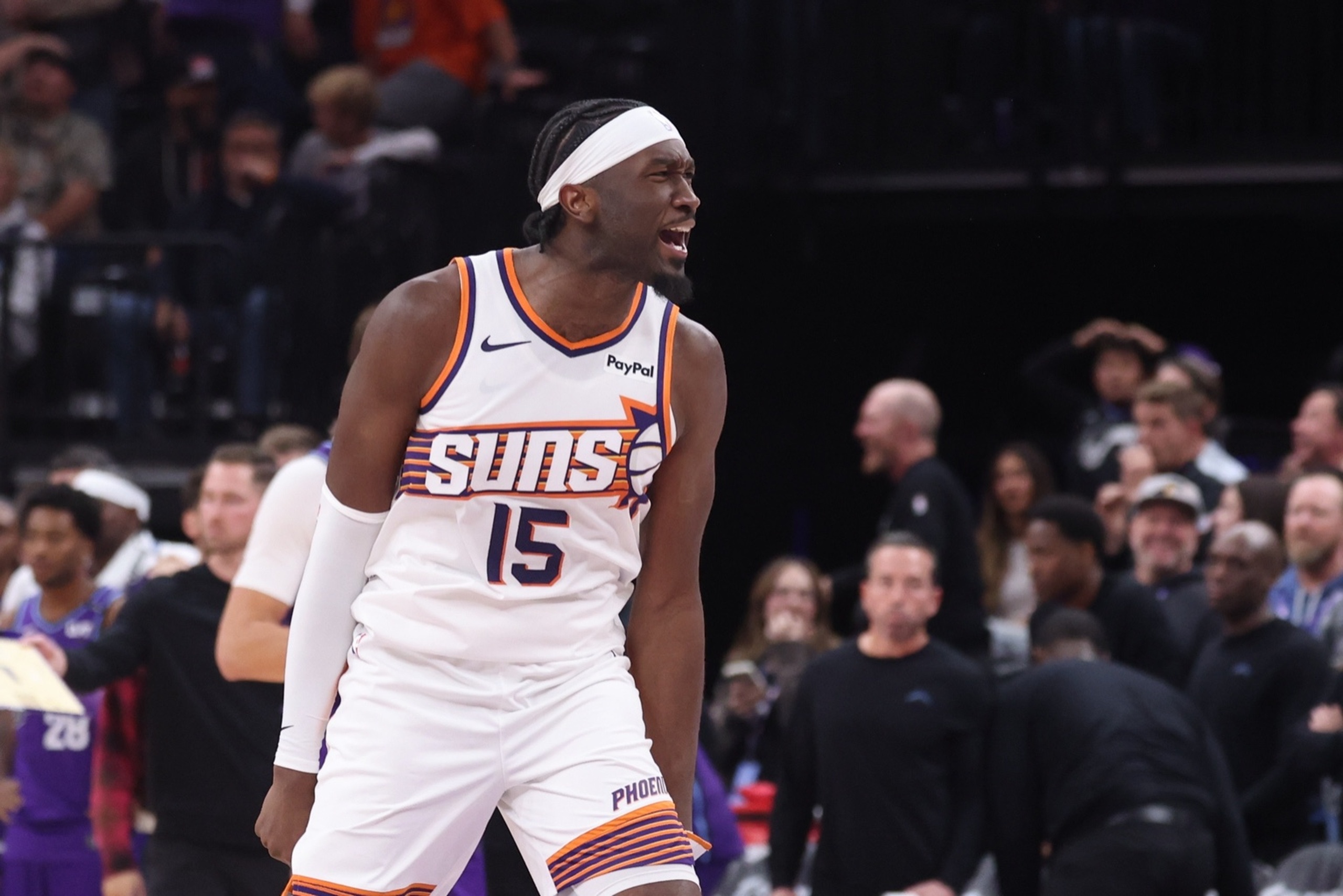 Oct 27, 2025; Salt Lake City, Utah, USA; Phoenix Suns center Mark Williams (15) reacts to tipping a ball in for a basket to tie the game against the Utah Jazz in the last seconds of the fourth quarter at Delta Center. Mandatory Credit: Rob Gray-Imagn Images