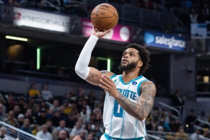 Nov 19, 2025; Indianapolis, Indiana, USA; Charlotte Hornets forward Miles Bridges (0) shoots the ball in the first half against the Indiana Pacers at Gainbridge Fieldhouse. Mandatory Credit: Trevor Ruszkowski-Imagn Images