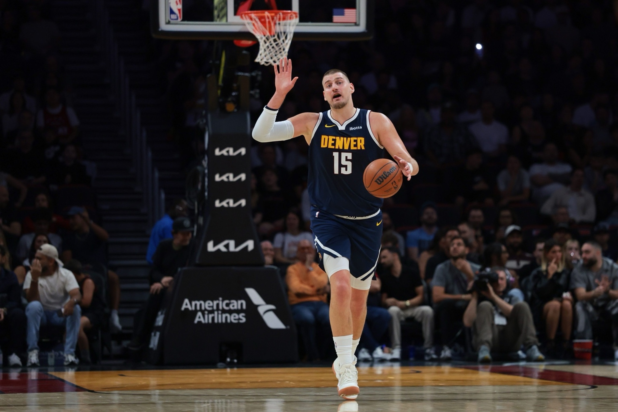 Dec 29, 2025; Miami, Florida, USA; Denver Nuggets center Nikola Jokic (15) dribbles the basketball against the Miami Heat during the first quarter at Kaseya Center. Mandatory Credit: Sam Navarro-Imagn Images