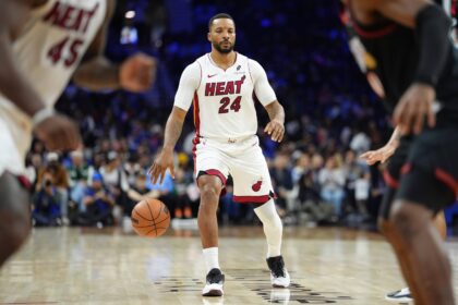Miami Heat guard Norman Powell (24) controls the ball against the Philadelphia 76ers in the second quarter at Xfinity Mobile Arena. Mandatory Credit: Kyle Ross-Imagn Images