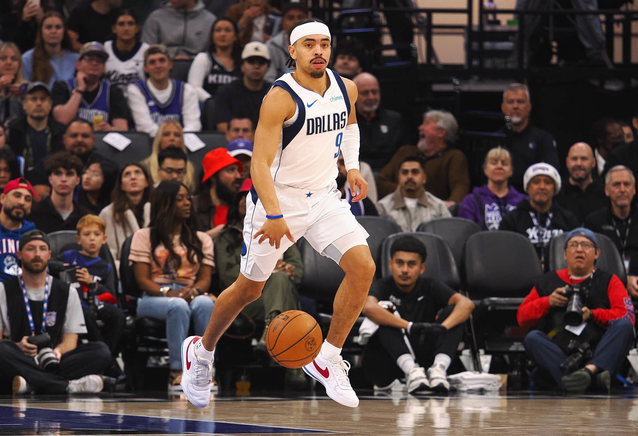 Dallas Mavericks guard Ryan Nembhard (9) controls the ball against the Sacramento Kings during the first quarter at Golden 1 Center.