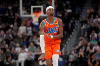 San Francisco, California, USA; Oklahoma City Thunder guard Shai Gilgeous-Alexander (2) reacts after making a basket against the Golden State Warriors in the fourth quarter at the Chase Center. Mandatory Credit: Cary Edmondson-Imagn Images