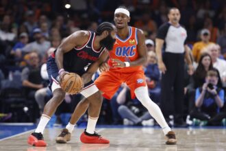 Nov 11, 2024; Oklahoma City, Oklahoma, USA; Oklahoma City Thunder guard Shai Gilgeous-Alexander (2) defends a drive by Los Angeles Clippers guard James Harden (1) during the second quarter at Paycom Center. Mandatory Credit: Alonzo Adams-Imagn Images