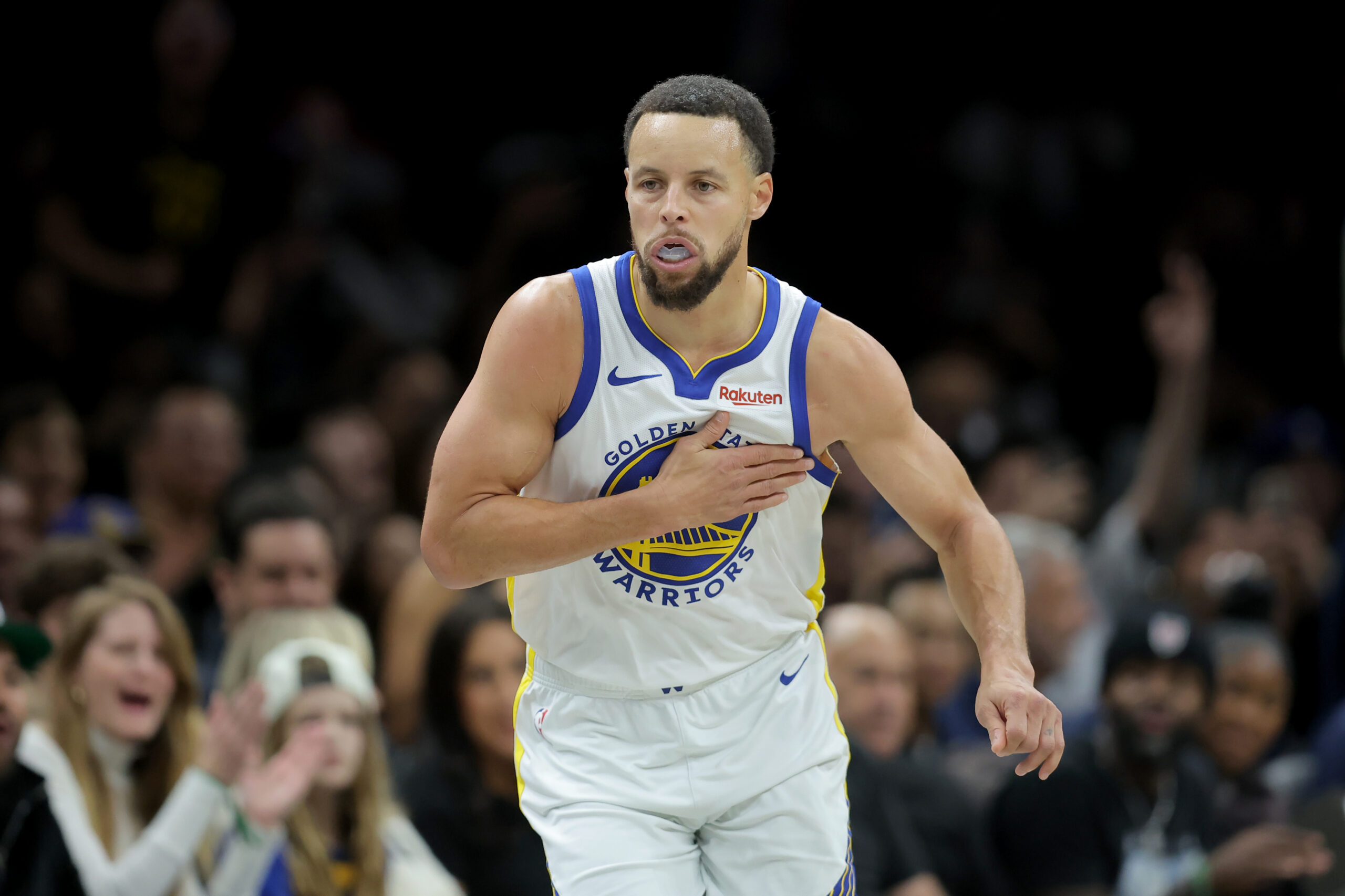 Brooklyn, New York, USA; Golden State Warriors guard Stephen Curry (30) reacts after making a three point shot against the Brooklyn Nets during the third quarter at Barclays Center. Mandatory Credit: Brad Penner-Imagn Images