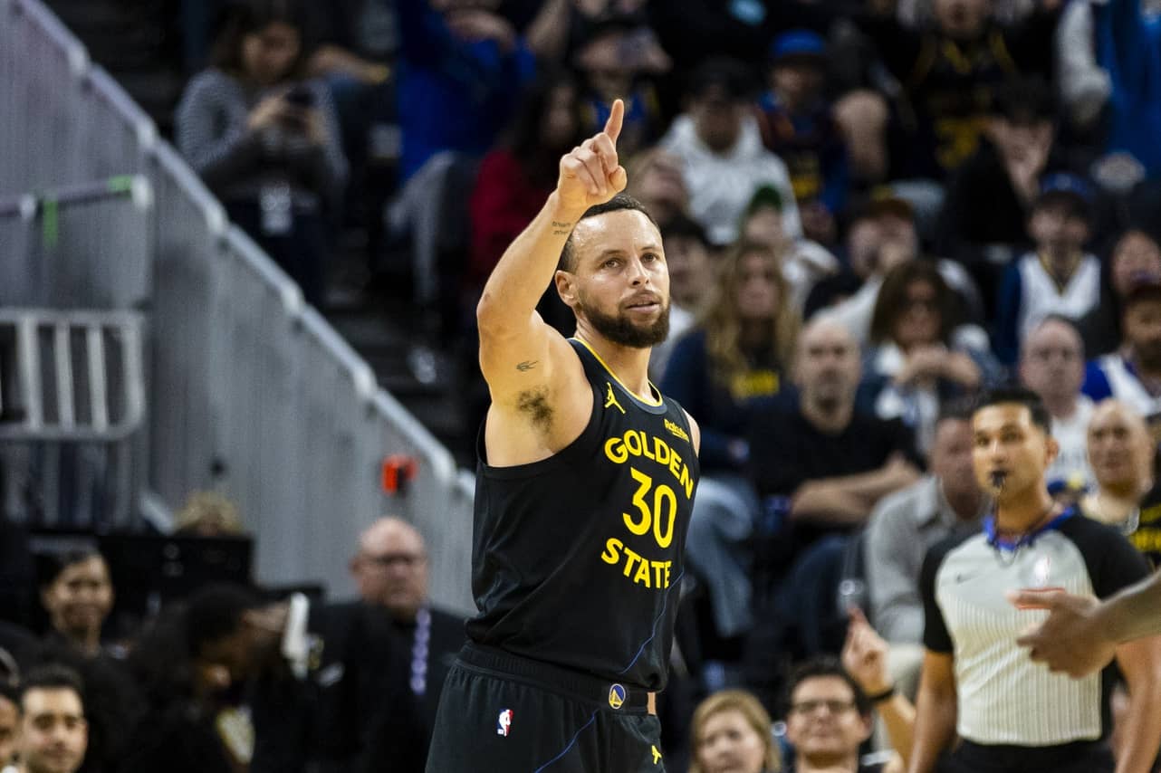 Dec 20, 2025; San Francisco, California, USA; Golden State Warriors guard Stephen Curry (30) reacts after scoring against the Phoenix Suns during the fourth quarter at Chase Center. Mandatory Credit: John Hefti-Imagn Images