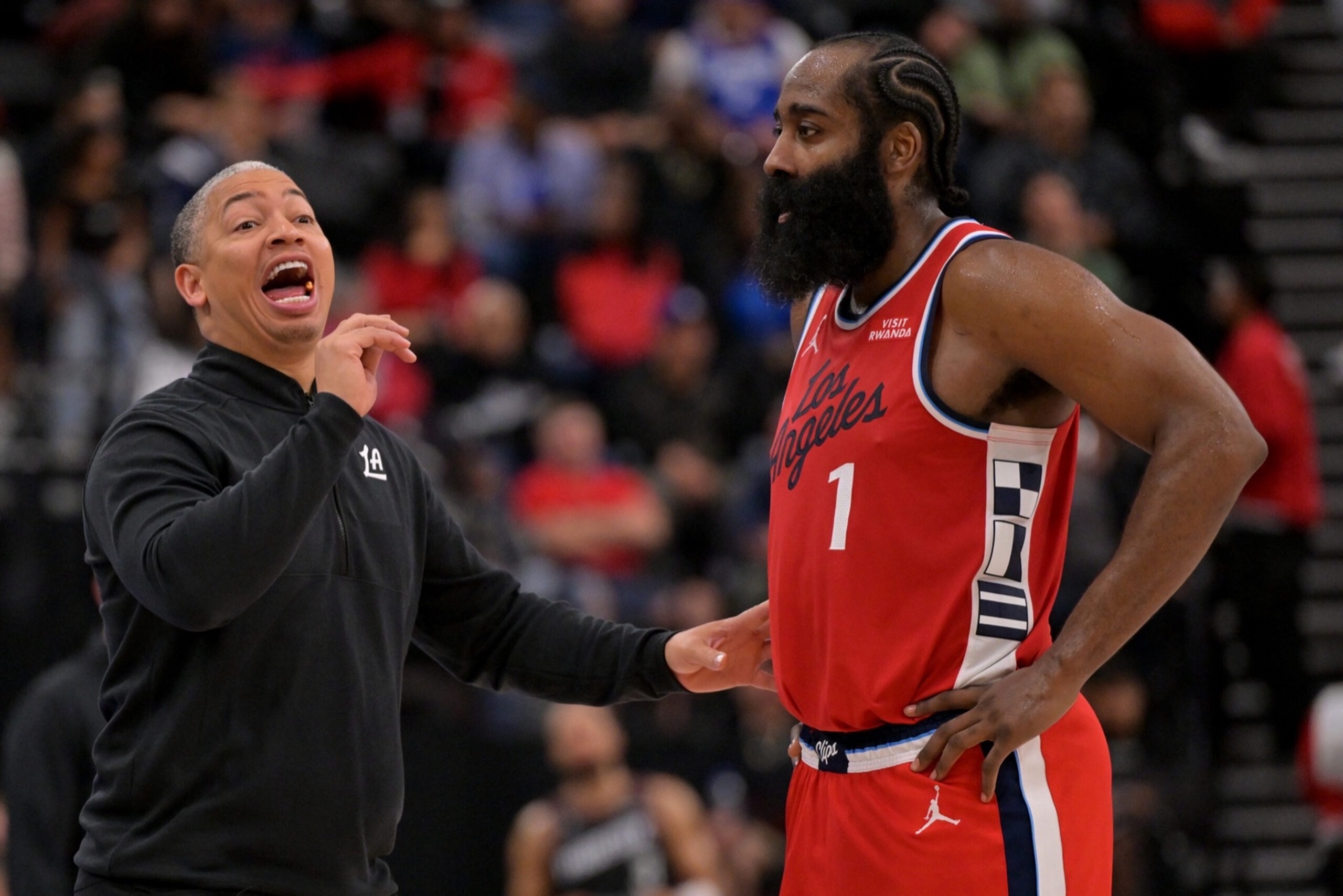 Nov 8, 2025; Inglewood, California, USA; Los Angeles Clippers head coach Tyronn Lue and guard James Harden (1) on the sidelines during the second half against the Phoenix Suns at Intuit Dome. Mandatory Credit: Jayne Kamin-Oncea-Imagn Images