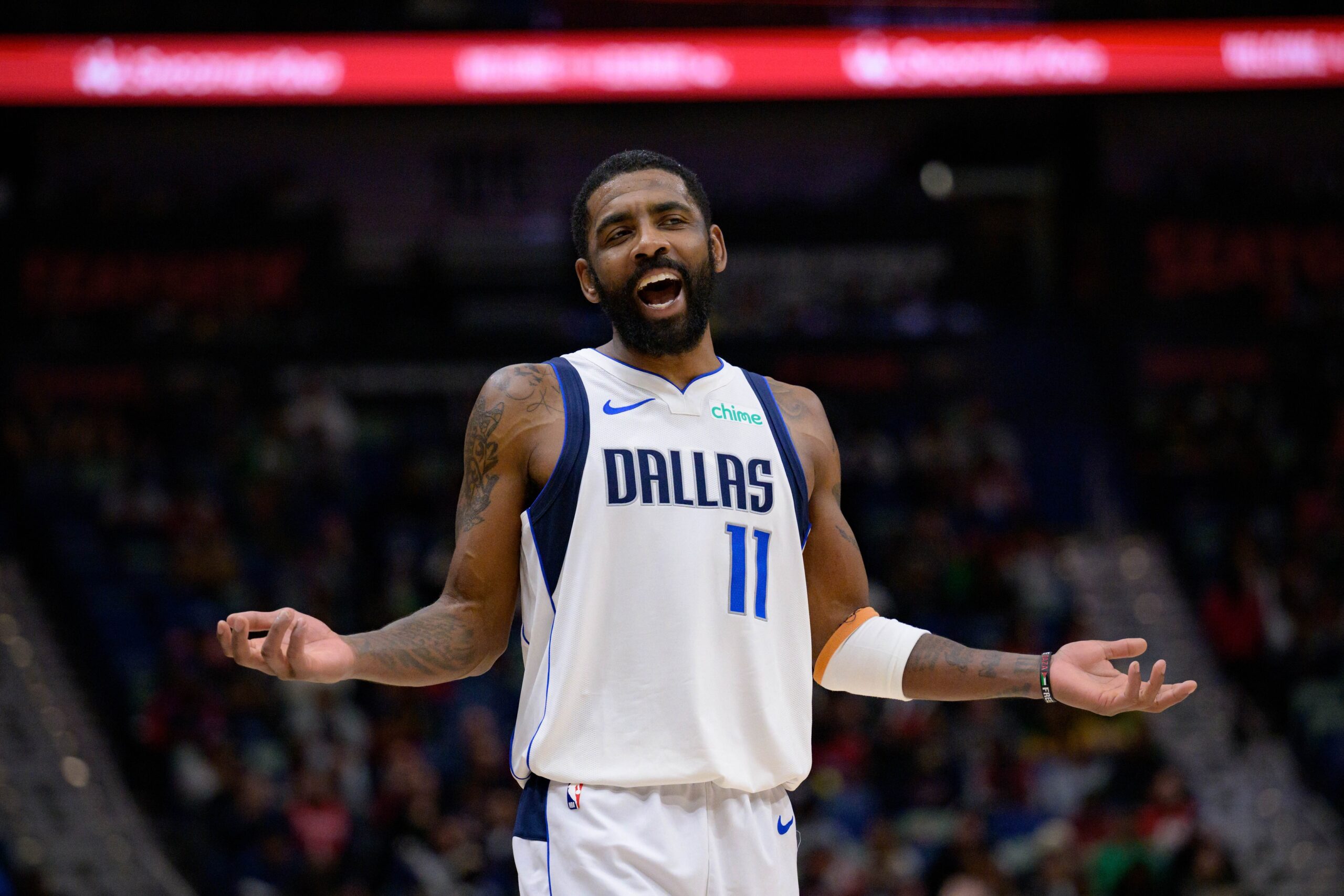 Jan 29, 2025; New Orleans, Louisiana, USA; Dallas Mavericks guard Kyrie Irving (11) reacts to fan during the second half against the New Orleans Pelicans at Smoothie King Center. Mandatory Credit: Matthew Hinton-Imagn Images