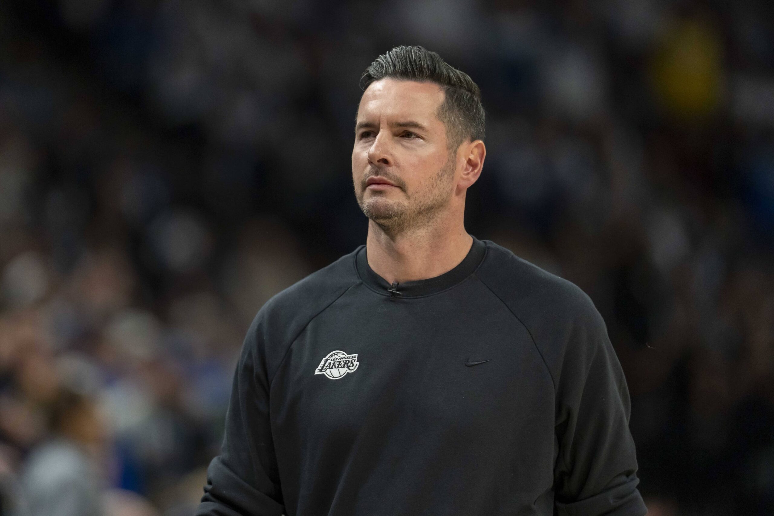 Minneapolis, Minnesota, USA; Los Angeles Lakers head coach JJ Redick looks on against the Minnesota Timberwolves in the first half during game three of first round for the 2024 NBA Playoffs at Target Center. Mandatory Credit: Jesse Johnson-Imagn Images