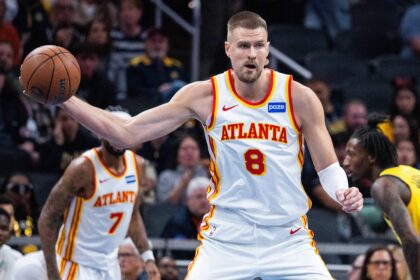 Oct 31, 2025; Indianapolis, Indiana, USA; Atlanta Hawks center Kristaps Porzingis (8) holds the ball while Indiana Pacers forward Isaiah Jackson (22) defends in the first half at Gainbridge Fieldhouse. Mandatory Credit: Trevor Ruszkowski-Imagn Images