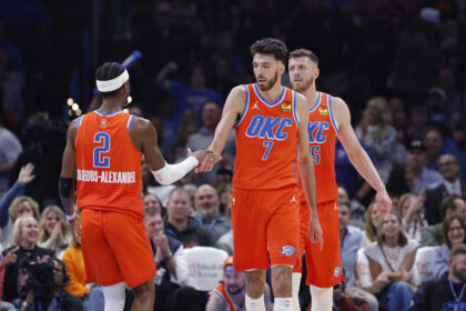 Nov 11, 2025; Oklahoma City, Oklahoma, USA; Oklahoma City Thunder center Chet Holmgren (7) and Oklahoma City Thunder guard Shai Gilgeous-Alexander (2) celebrate after scoring against the Golden State Warriors during the second half at Paycom Center. Mandatory Credit: Alonzo Adams-Imagn Images