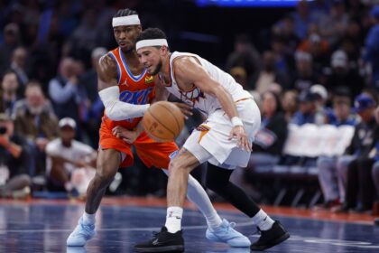 Nov 28, 2025; Oklahoma City, Oklahoma, USA;Oklahoma City Thunder guard Shai Gilgeous-Alexander (2) forces Phoenix Suns guard Devin Booker (1) to turn over the ball during the second half at Paycom Center. Mandatory Credit: Alonzo Adams-Imagn Images