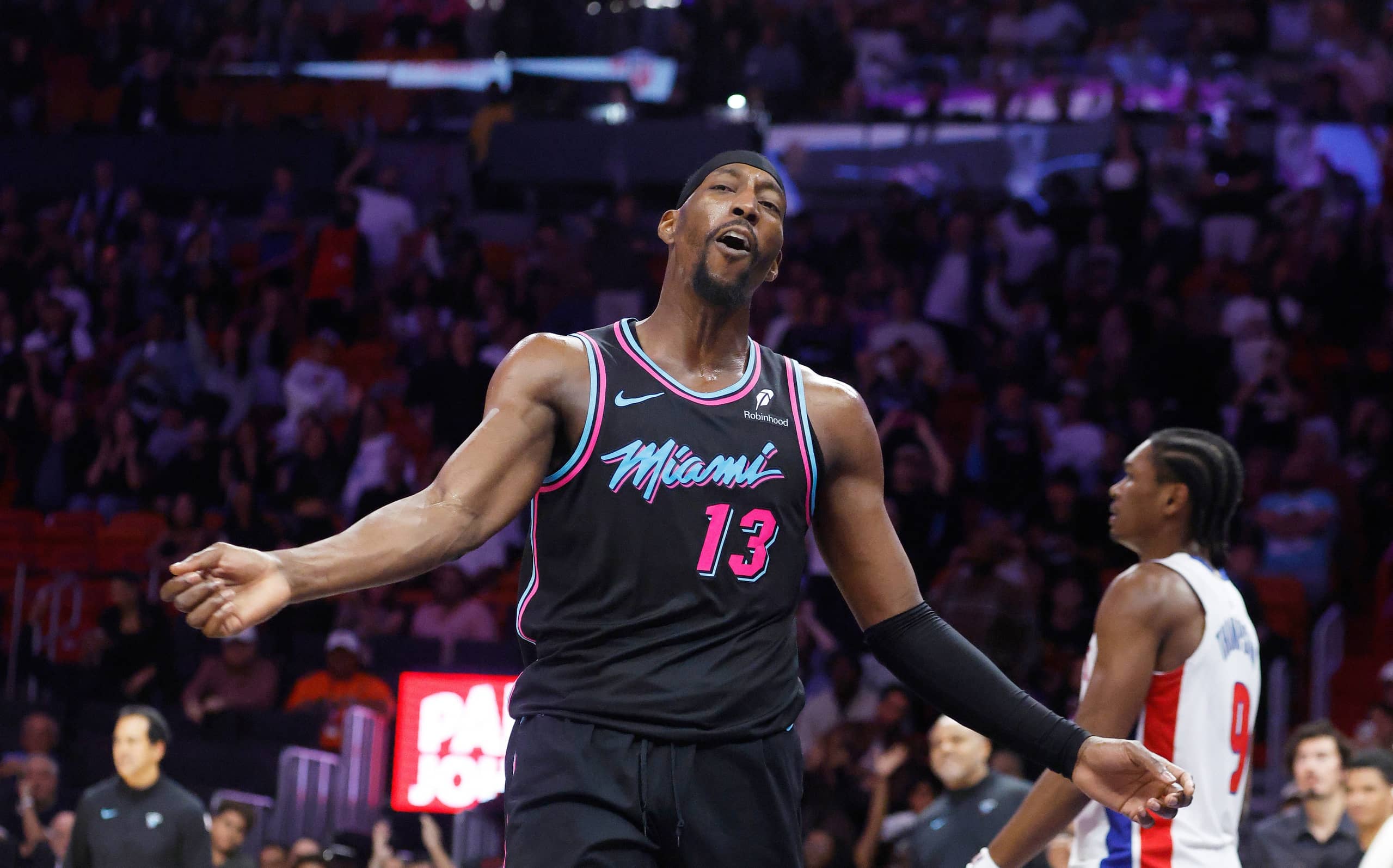 Miami, Florida, USA; Miami Heat center Bam Adebayo (13) reacts against the Detroit Pistons during the second half at Kaseya Center. Mandatory Credit: Rhona Wise-Imagn Images