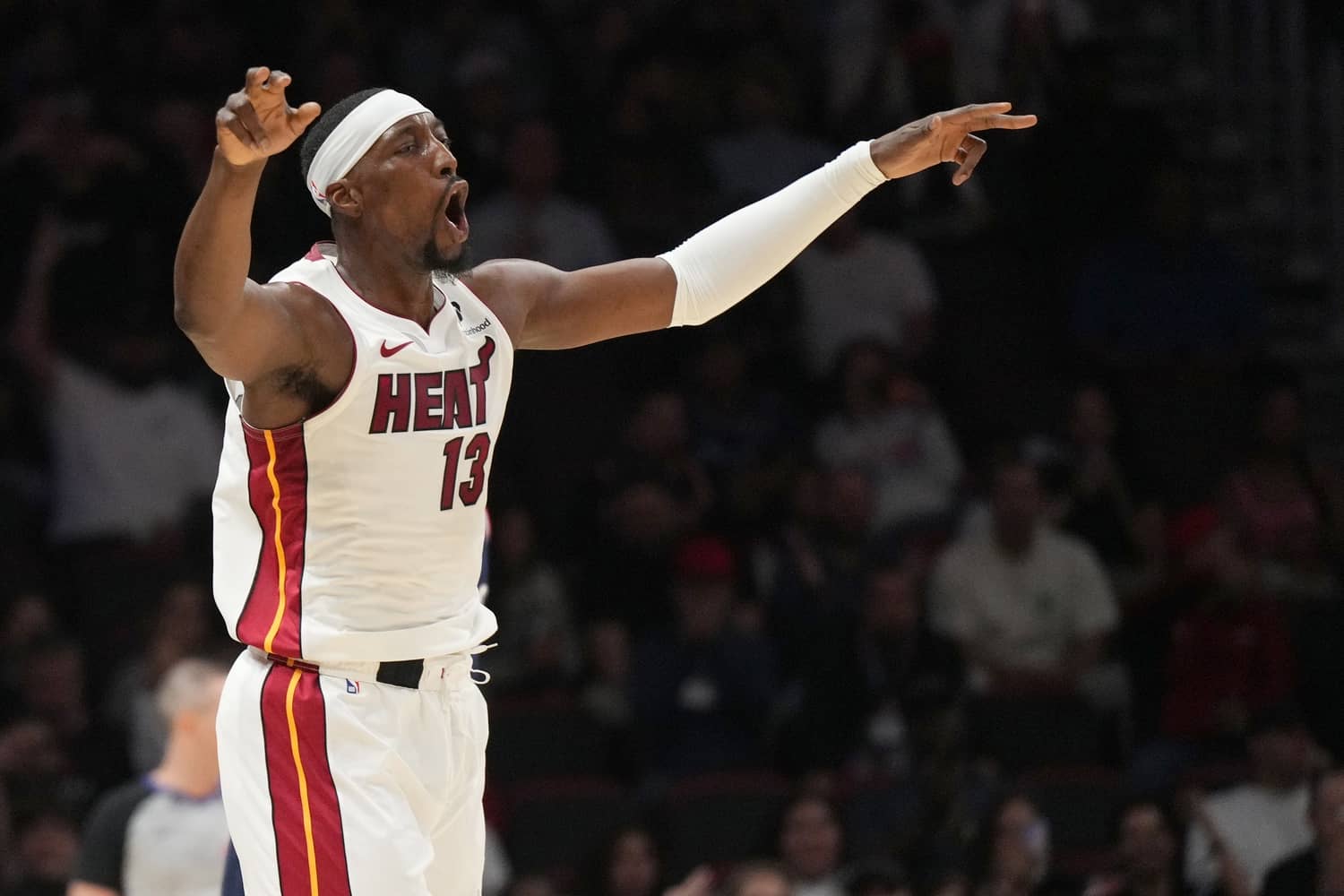 Dec 1, 2025; Miami, Florida, USA; Miami Heat center Bam Adebayo (13) celebrates a three-pointer during the first half against the Los Angeles Clippers at Kaseya Center. Mandatory Credit: Jim Rassol-Imagn Images