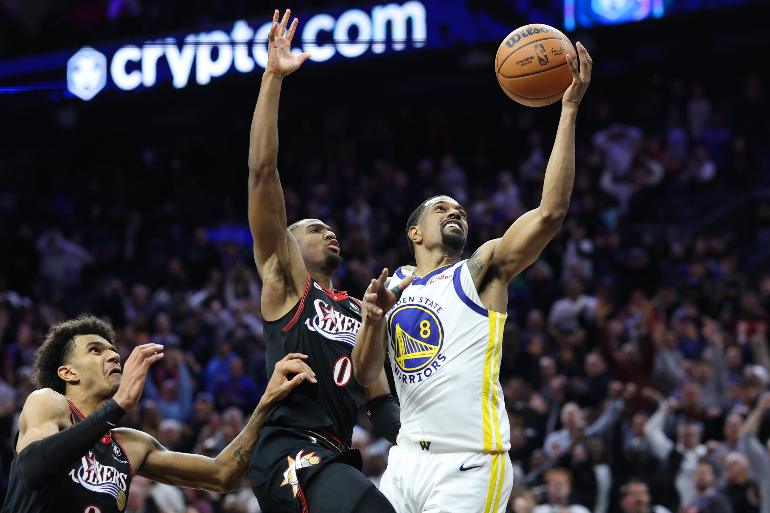 Dec 4, 2025; Philadelphia, Pennsylvania, USA; Philadelphia 76ers guard Tyrese Maxey (0) blocks the final shot of the game by Golden State Warriors guard De'Anthony Melton (8) to secure the victory at Xfinity Mobile Arena. Mandatory Credit: Bill Streicher-Imagn Images