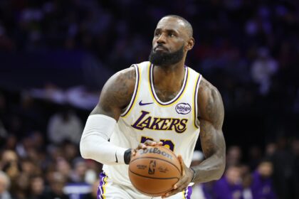 Philadelphia, Pennsylvania, USA; Los Angeles Lakers forward Lebron James (23) shoots against the Philadelphia 76ers during the fourth quarter at Xfinity Mobile Arena. Mandatory Credit: Bill Streicher-Imagn Images