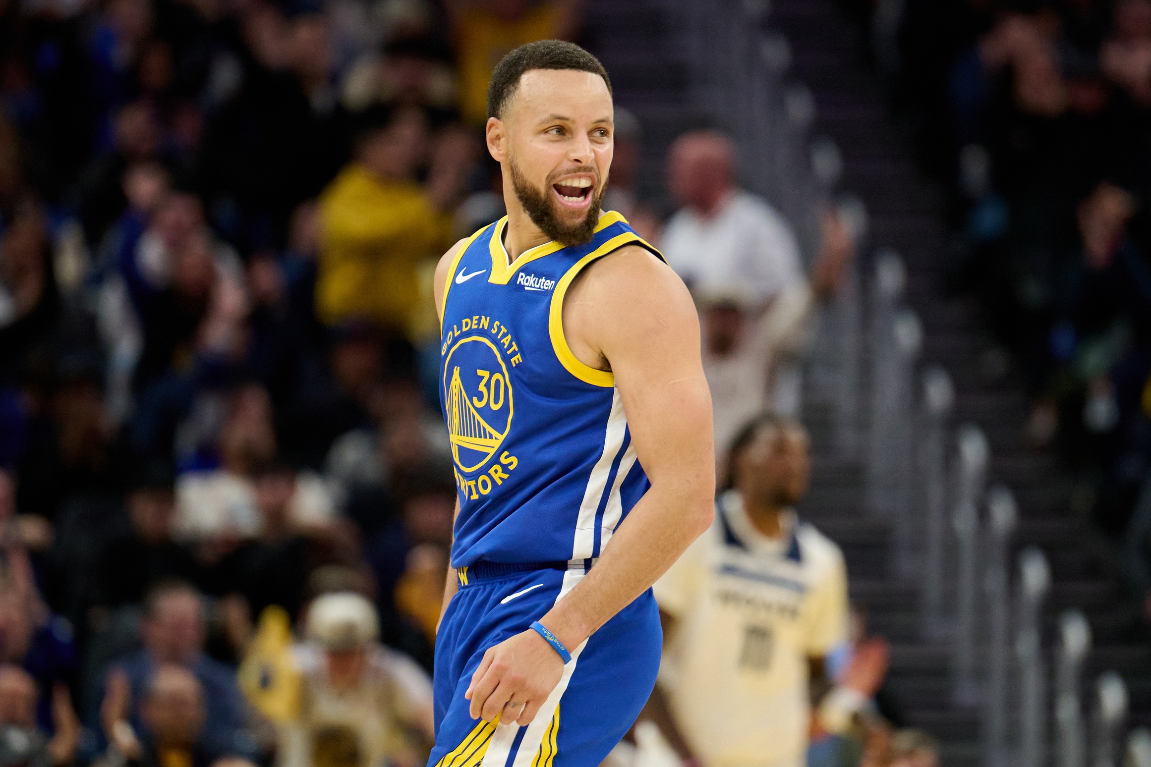 Dec 12, 2025; San Francisco, California, USA; Golden State Warriors guard Stephen Curry (30) reacts toward the Minnesota Timberwolves bench after making a three-point shot during the fourth quarter at Chase Center. Mandatory Credit: Robert Edwards-Imagn Images