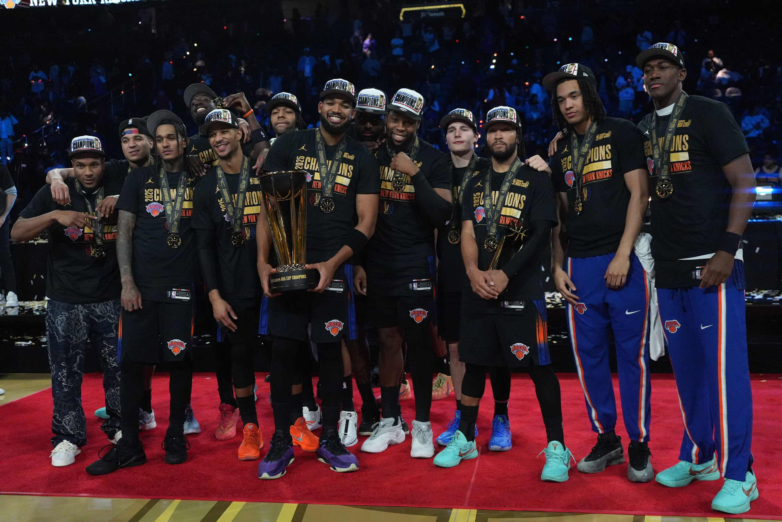 Dec 16, 2025; Las Vegas, Nevada, USA; The New York Knicks pose for a photograph after winning the Emirates NBA Cup Final at T-Mobile Arena. Mandatory Credit: Kirby Lee-Imagn Images