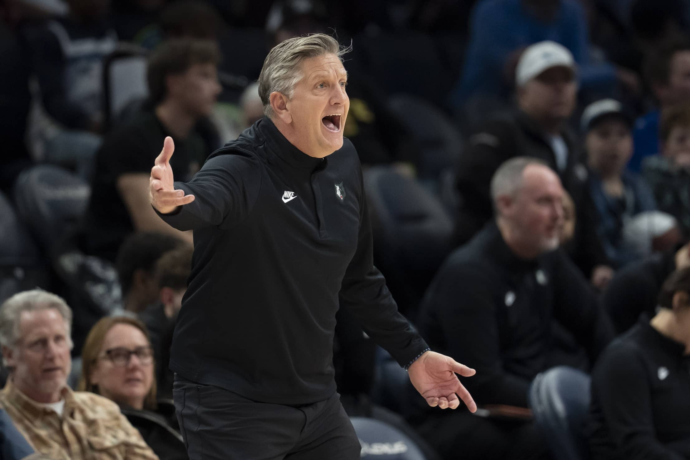 Dec 17, 2025; Minneapolis, Minnesota, USA; Minnesota Timberwolves head coach Chris Finch reacts towards an official after a call against the Memphis Grizzlies in the second half at Target Center. Mandatory Credit: Jesse Johnson-Imagn Images
