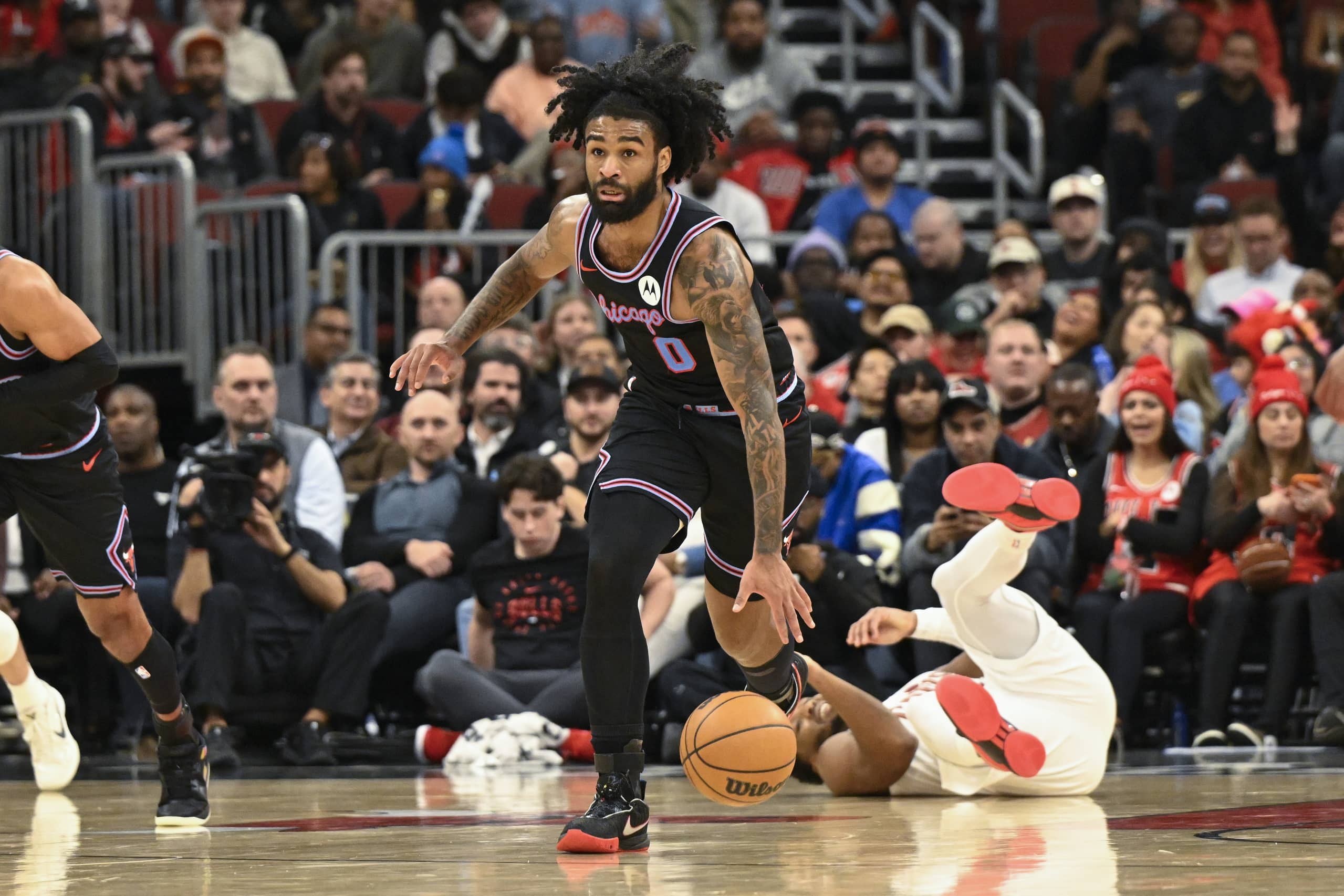 Dec 17, 2025; Chicago, Illinois, USA; Chicago Bulls guard Coby White (0) moves the ball against the Cleveland Cavaliers during the second half at United Center. Mandatory Credit: Matt Marton-Imagn Images
