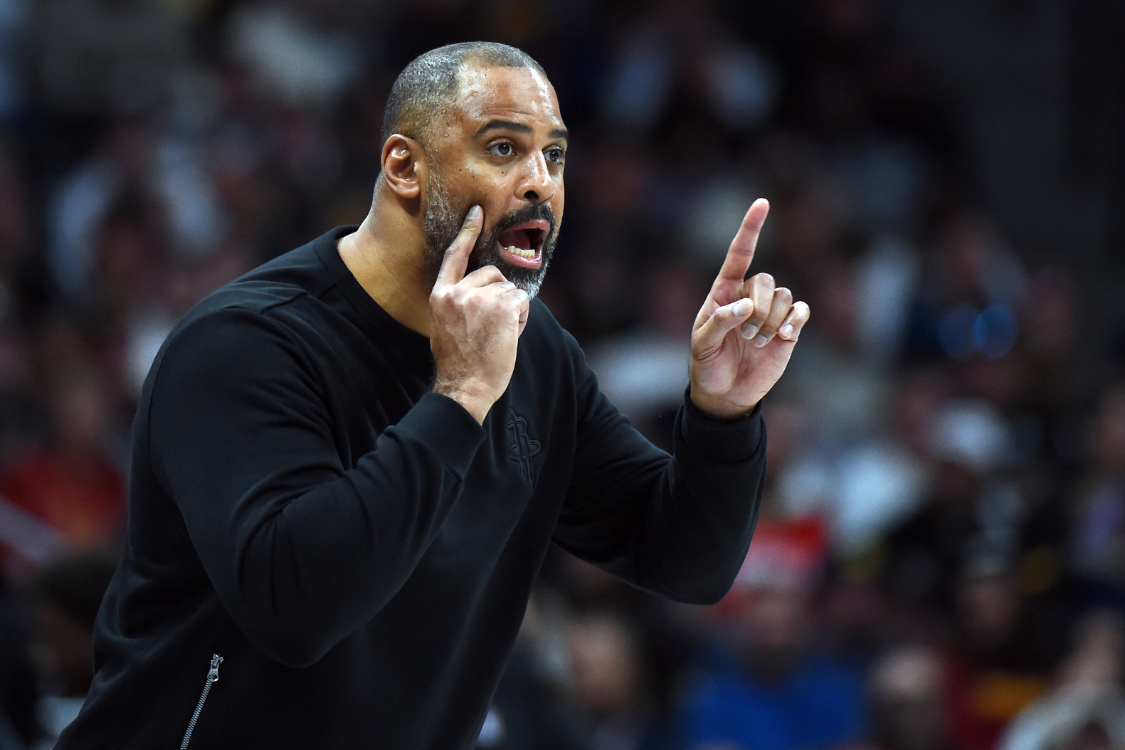 Dec 20, 2025; Denver, Colorado, USA; Houston Rockets head coach Ime Udoka yells rom the bench during the second half against the Denver Nuggets at Ball Arena. Mandatory Credit: Christopher Hanewinckel-Imagn Images