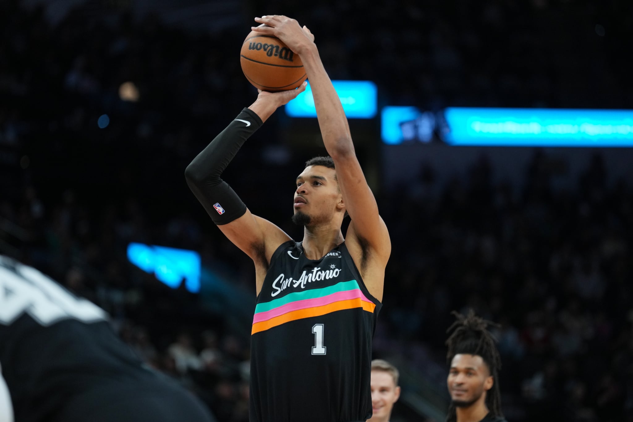 Dec 29, 2025; San Antonio, Texas, USA; San Antonio Spurs forward Victor Wembanyama (1) shoots a free throw in the second half against the Cleveland Cavaliers at Frost Bank Center. Mandatory Credit: Daniel Dunn-Imagn Images