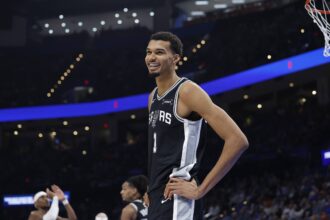 Oklahoma City, Oklahoma, USA; San Antonio Spurs forward Victor Wembanyama (1) smiles after a play against the Oklahoma City Thunder during the second half at Paycom Center. Mandatory Credit: Alonzo Adams-Imagn Images
