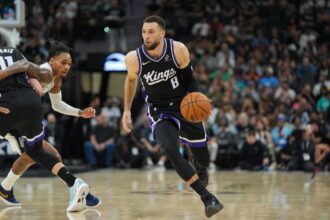 Nov 16, 2025; San Antonio, Texas, USA; Sacramento Kings guard Zach LaVine (8) dribbles in the second half against the San Antonio Spurs at Frost Bank Center. Mandatory Credit: Daniel Dunn-Imagn Images