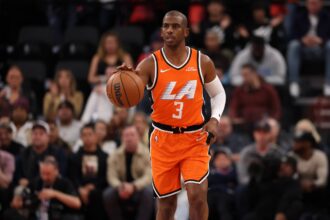 Inglewood, California, USA; Los Angeles Clippers guard Chris Paul (3) brings the ball up court during the first quarter against the Dallas Mavericks at Intuit Dome. Mandatory Credit: Kiyoshi Mio-Imagn Images