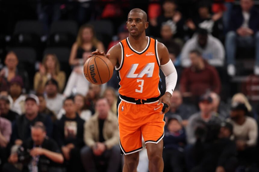 Inglewood, California, USA; Los Angeles Clippers guard Chris Paul (3) brings the ball up court during the first quarter against the Dallas Mavericks at Intuit Dome. Mandatory Credit: Kiyoshi Mio-Imagn Images