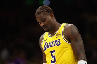 Phoenix, Arizona, USA; Los Angeles Lakers center Deandre Ayton (5) reacts against the Phoenix Suns at Mortgage Matchup Center. Mandatory Credit: Mark J. Rebilas-Imagn Images