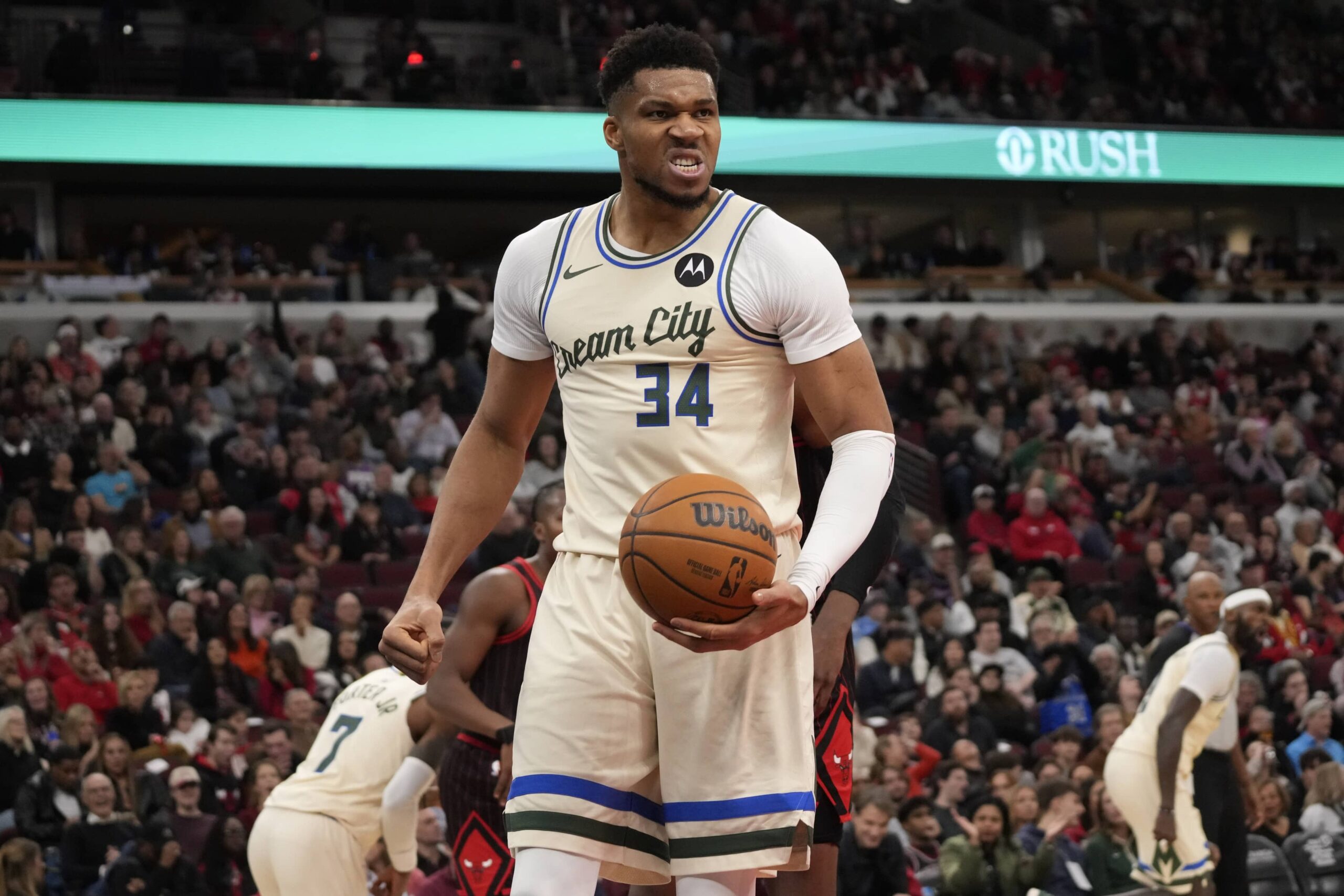 Chicago, Illinois, USA; Milwaukee Bucks forward Giannis Antetokounmpo (34) reacts after scoring against the Chicago Bulls during the second half at United Center. Mandatory Credit: David Banks-Imagn Images