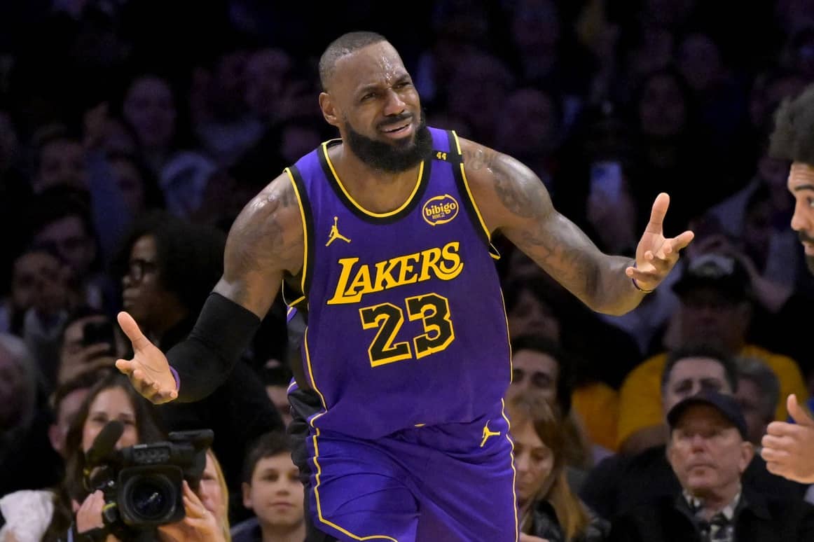 Los Angeles, California, USA; Los Angeles Lakers forward LeBron James (23) reacts after a foul call against the Brooklyn Nets at Crypto.com Arena. Mandatory Credit: Jayne Kamin-Oncea-Imagn Images