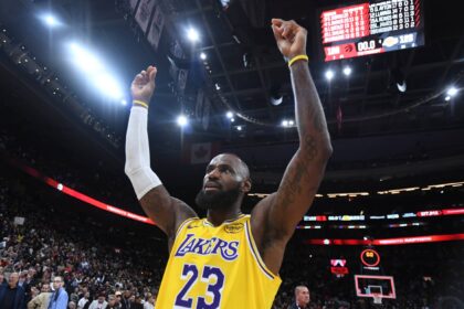 Toronto, Ontario, CAN; Los Angeles Lakers forward LeBron James (23) reacts after a win over the Toronto Raptors at Scotiabank Arena. Mandatory Credit: Dan Hamilton-Imagn Images
