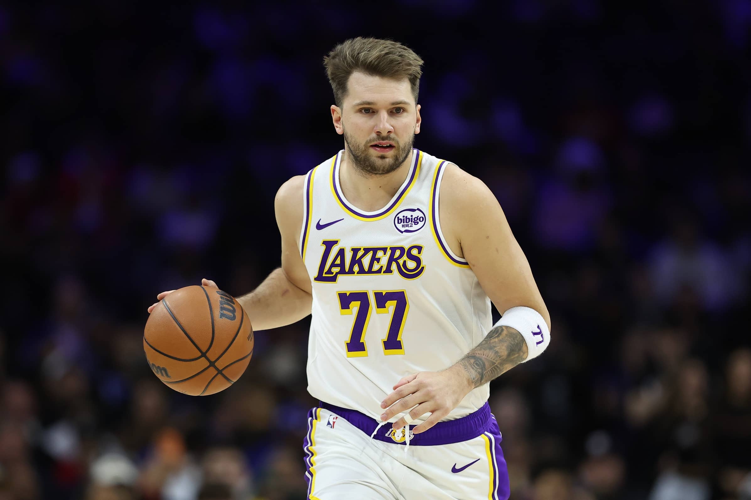 Philadelphia, Pennsylvania, USA; Los Angeles Lakers guard Luka Doncic (77) in action against the Philadelphia 76ers during the first quarter at Xfinity Mobile Arena. Mandatory Credit: Bill Streicher-Imagn Images