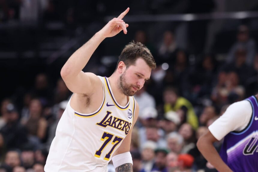 Salt Lake City, Utah, USA; Los Angeles Lakers guard Luka Doncic (77) reacts to a shot against the Utah Jazz during the second half at Delta Center. Mandatory Credit: Rob Gray-Imagn Images