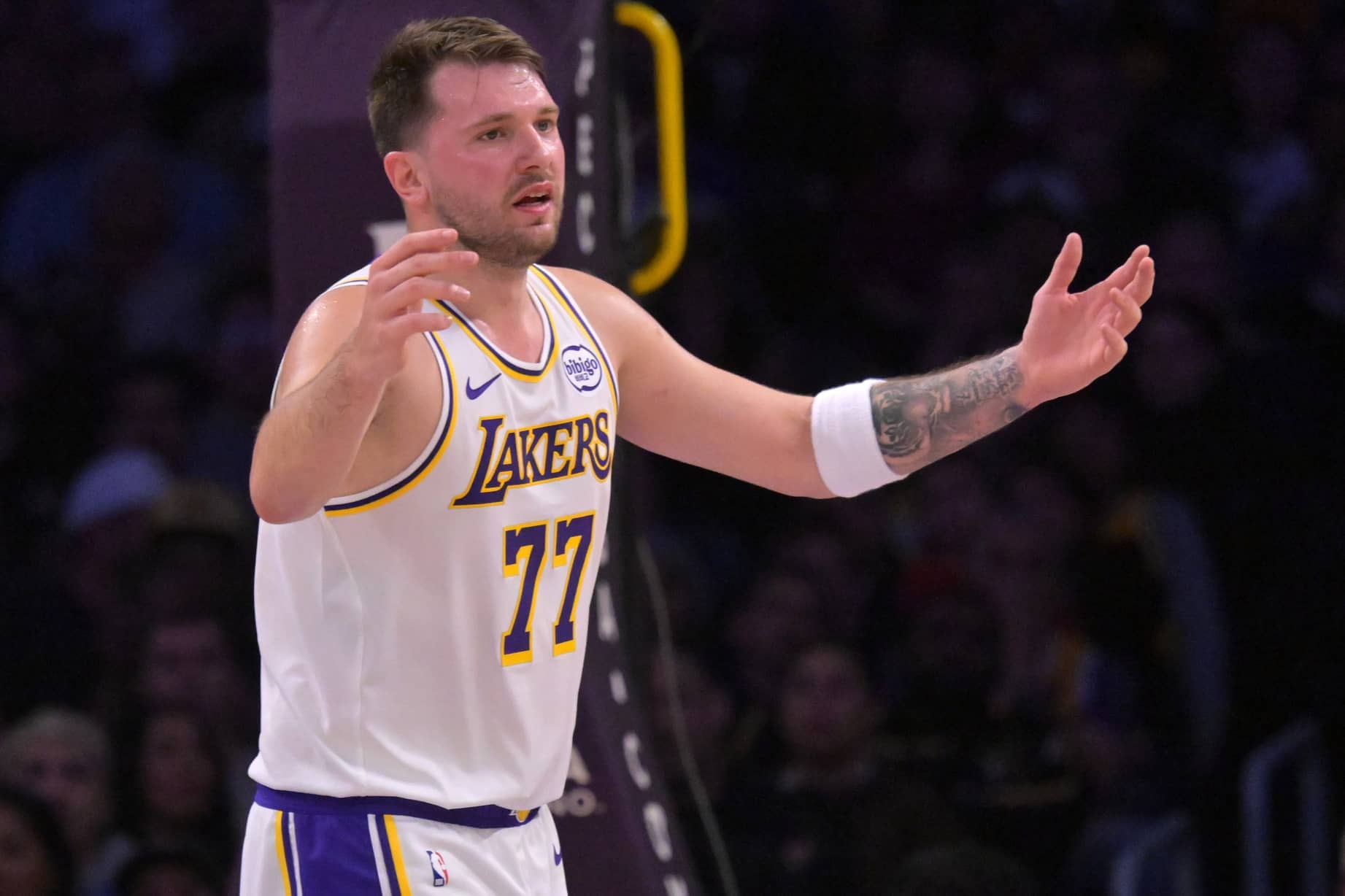 Los Angeles, California, USA; Los Angeles Lakers guard Luka Doncic (77) reacts after not getting a foul call in the first half against the Sacramento Kings at Crypto.com Arena. Mandatory Credit: Jayne Kamin-Oncea-Imagn Images